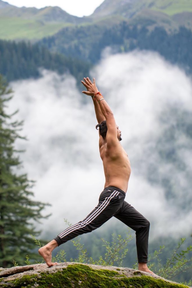 Arun practising yoga in the mountains of India